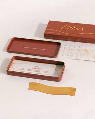 Zissa Starter Kit — 5 gold silicone scar sheets with tin, on white